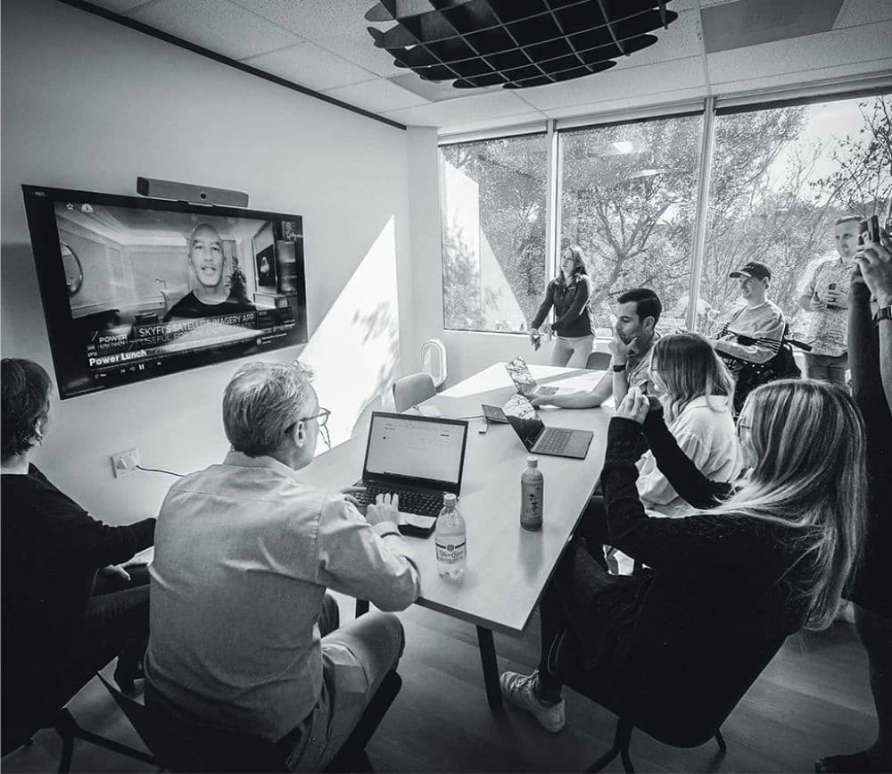 The SkyFi team collaborating in the Austin office