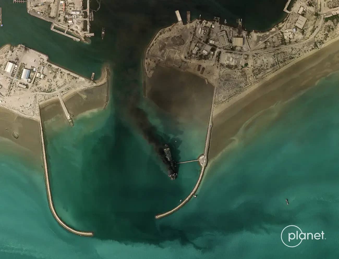 Planet Labs satellite imagery of IRINS Makran warship burning Bandar Abbas Iran March 2 2026